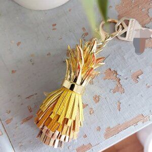 Anthropologie Gold and Yellow Leather Tassel Keychain